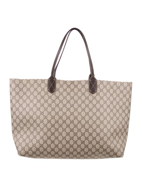 gucci supreme reversible tote|gucci reversible canvas tote.